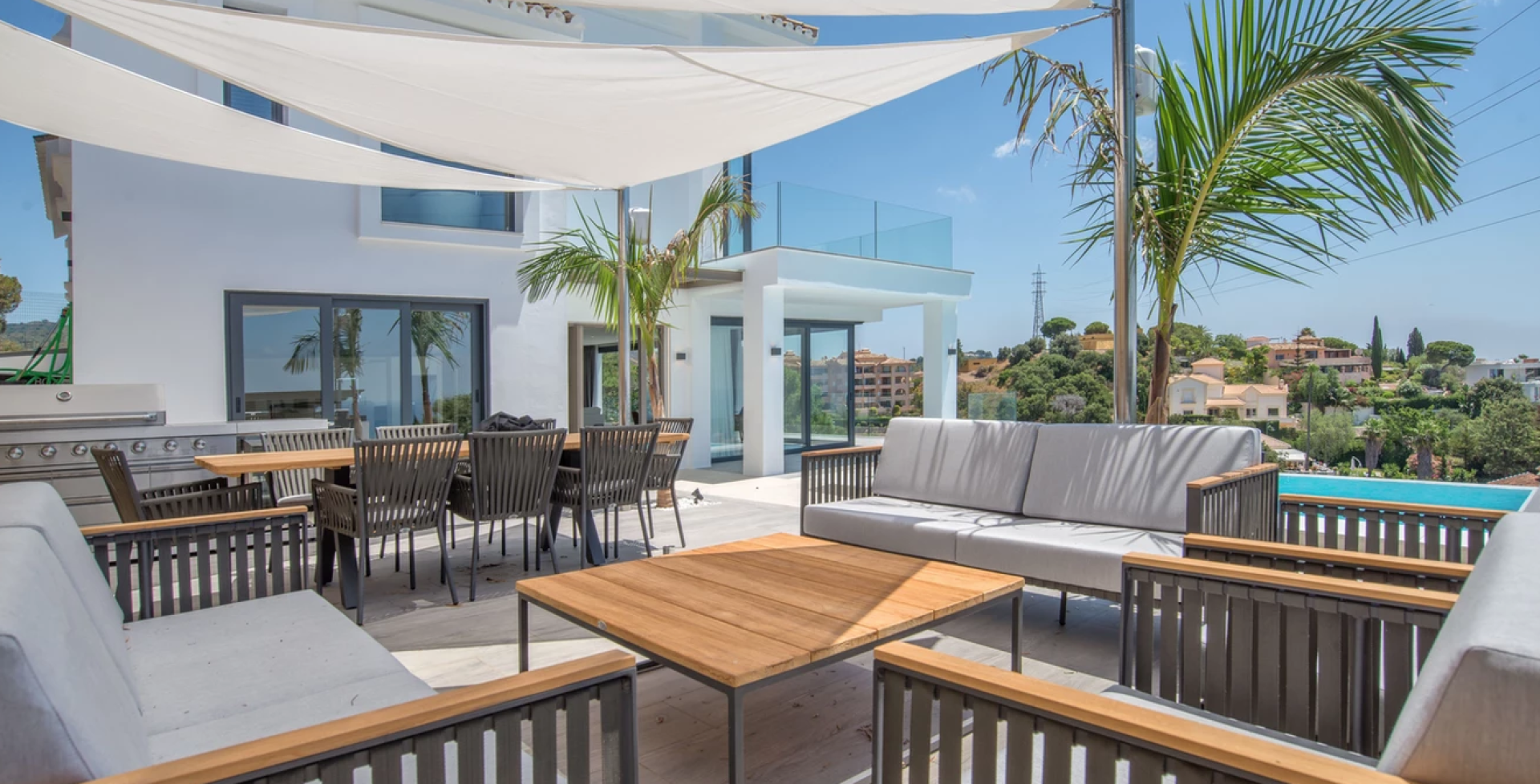 VILLA SUN 7 bedrooms Marbella holiday rental terrace seating sea views