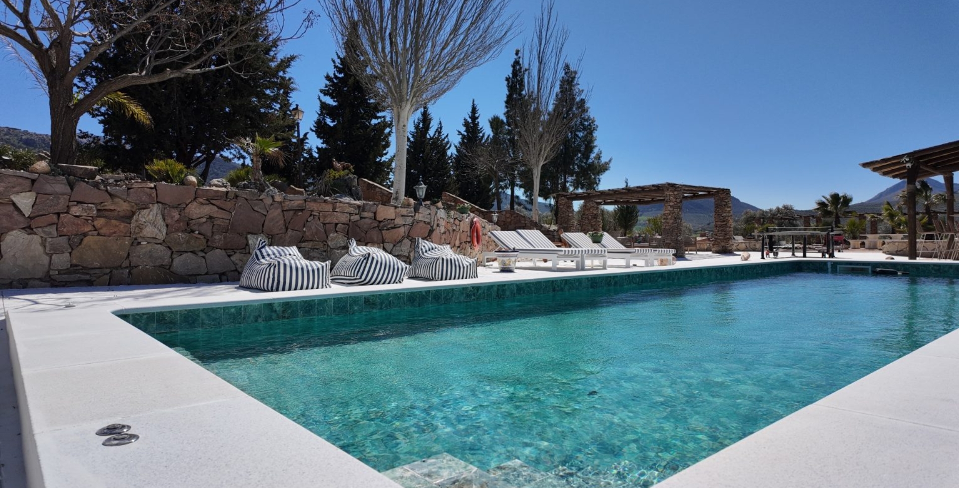 Finca-Paradise-pool and loungers 12 bedrooms luxury villas marbella